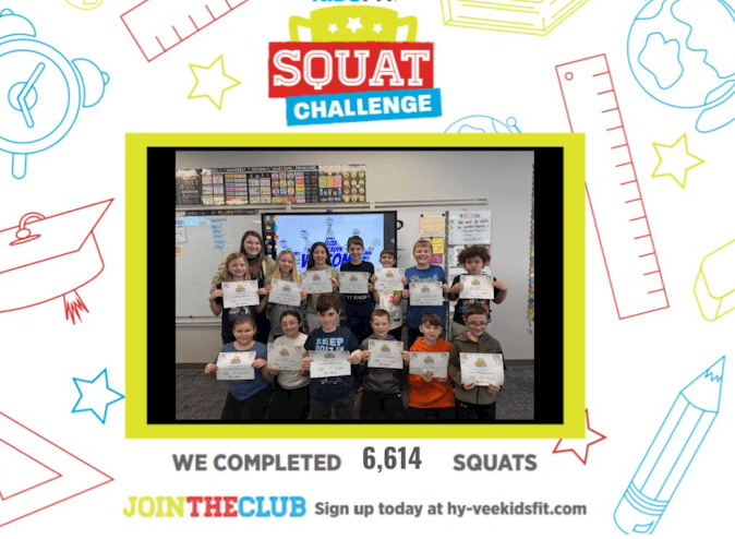 teacher with kid at table studying